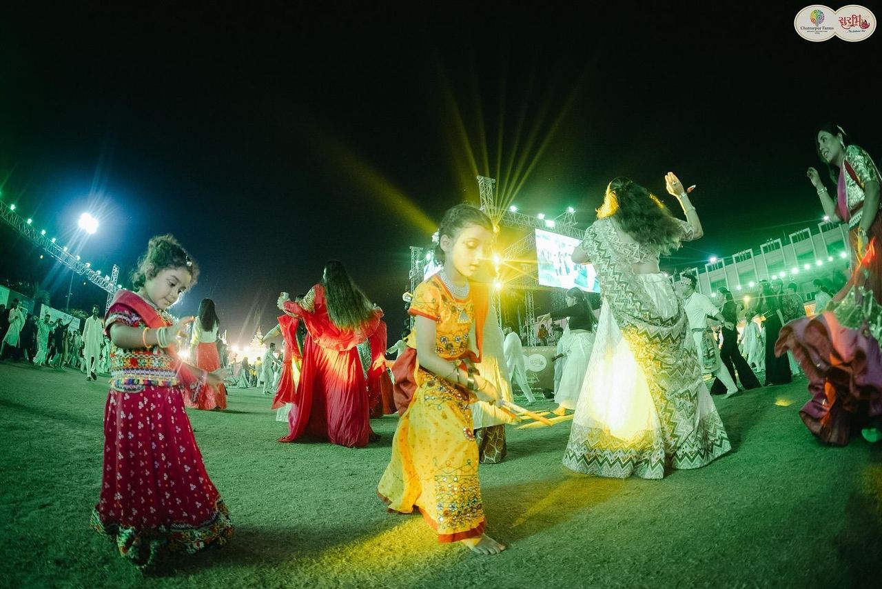 Children playing dandiya at Surbhi Garba Dhoom Dandiya 2025, Chattarpur Farms, Nagpur
