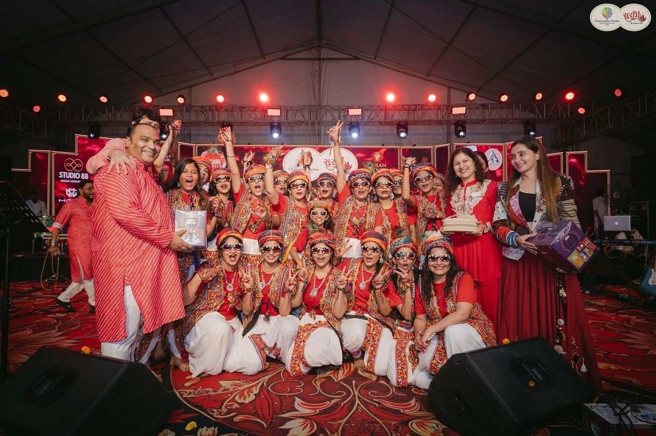 Prize distribution for the winning garba group at Surbhi Garba Dhoom Dandiya 2025, Chattarpur Farms, Nagpur